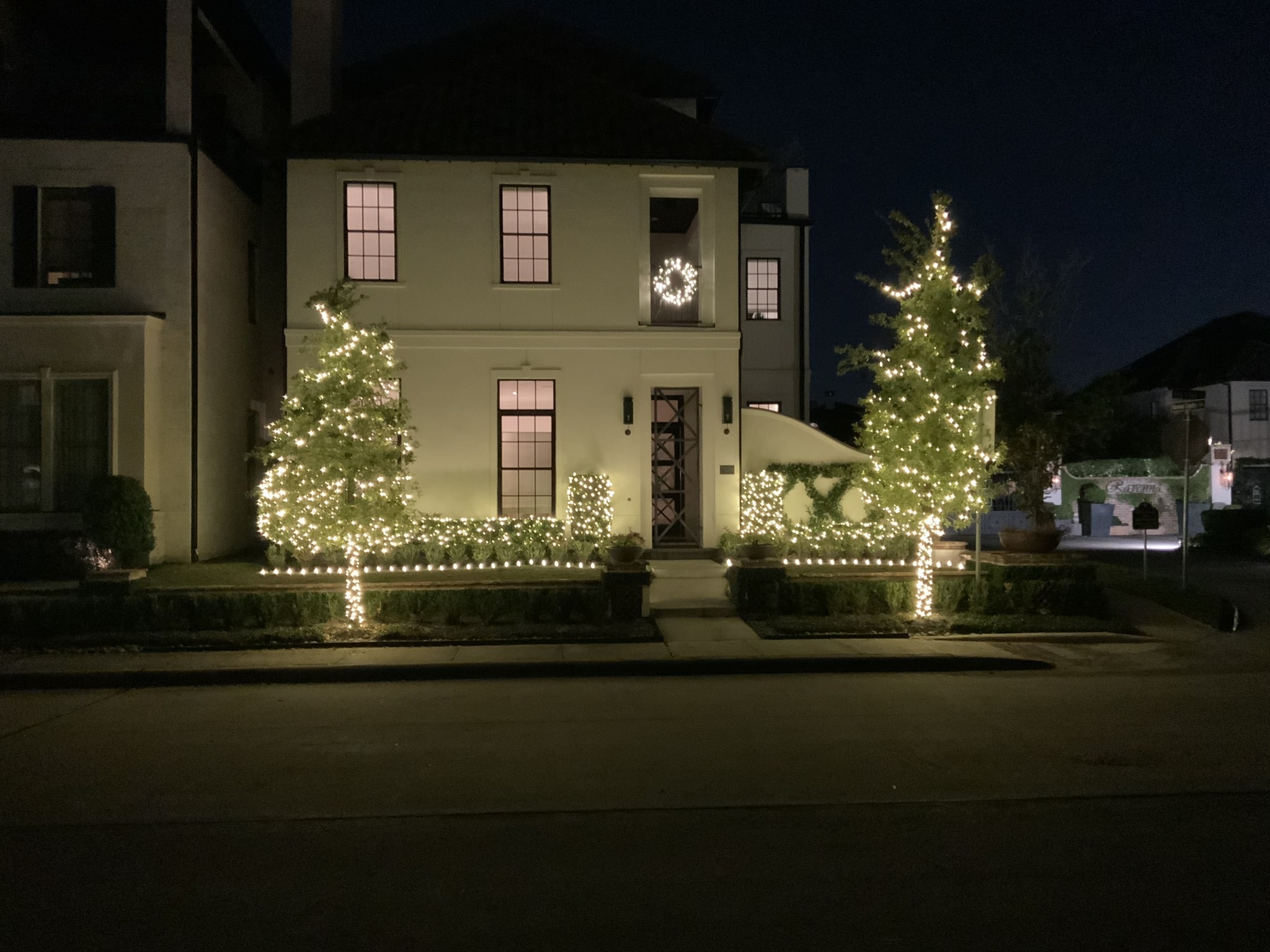 Exterior home decorated with lights. Light Up Your Holidays with ExoLights by Exoservices.